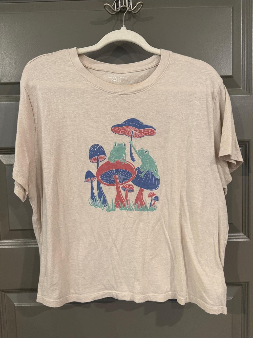 American Eagle Outfitters Beige Tee with Frog & Mushroom Graphic